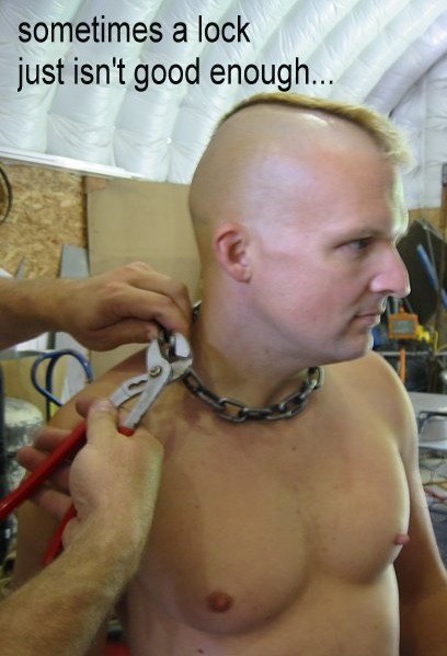ropenbag: “collared for life”  or until cut off in the trauma center while unconscious… Found this old photo from a previous life. Collared for 6 years. Yes, this can happen. 