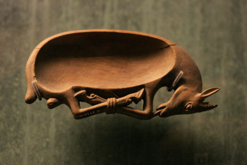 Ancient Egyptian wooden kohl spoon in the shape of a gazelle; artist and date unknown.  Now in 