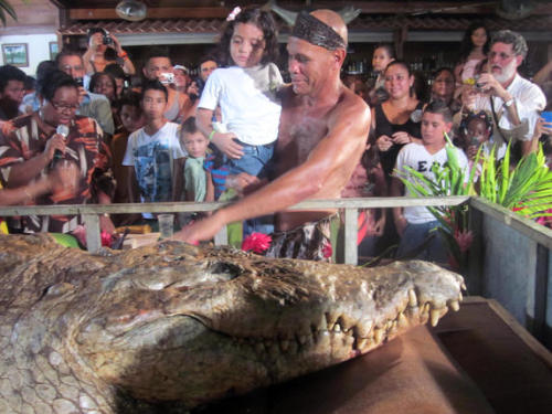 unexplained-events:  Chito and Pocho Chito says goodbye to his bestfriend Pocho, the seventeen foot half ton crocodile. Gilberto “Chito” Shedden found Pocho over 20 years wounded and near death. Pocho had been shot in the left eye by a cattle farmer.