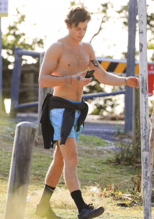 meninvogue: Shawn Mendes goes shirtless on the beach in Byron Bay in Australia