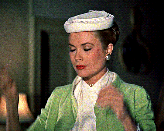 never cursed — I'm not much on rear-window ethics. Grace Kelly in