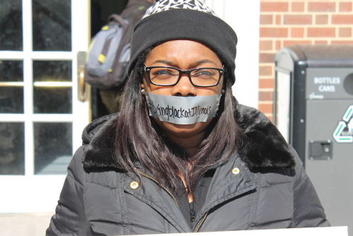 yo-tori:  kadyroxzwhat:  boobsanddimples:  l20music:  beingblackatillinois:  Several University of Illinois Students gathered on the quad for a silent protest against the oppressive remarks made to Black students.  Love this. I wanna see more of these