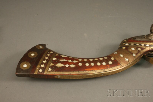 A pearly and brass decorated flintlock jezail originating from Afghanistan, lock is dated 1810.