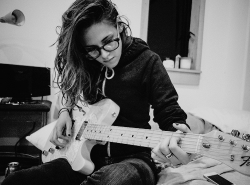 kristenstewartdailys:  “I love playing my guitar, but it doesn’t relax me. It drives me crazy.  I’m like, ‘Ah, no, that’s not what I wanted to play.’ I have no rhythm  either but I love it.” 