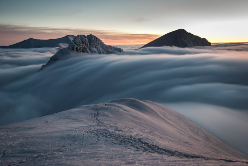 Clouds overflowing a mountain ridge in the Tatra Mountains, Poland / Slovakia Karol Majewski photogr