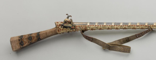 Turkish miquelet rifle decorated with silver, copper, and red coral, late 18th or early 19th century