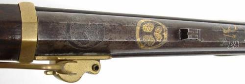 Silver and gold inlaid Japanese matchlock pistol with Tokugawa crest, circa 1660.from Collectors Fir