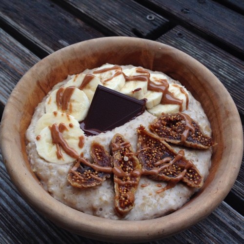 ixvna:maca oatmeal bowl with dried figs, banana, 75% cacao chocolate and almondbutter Happy April