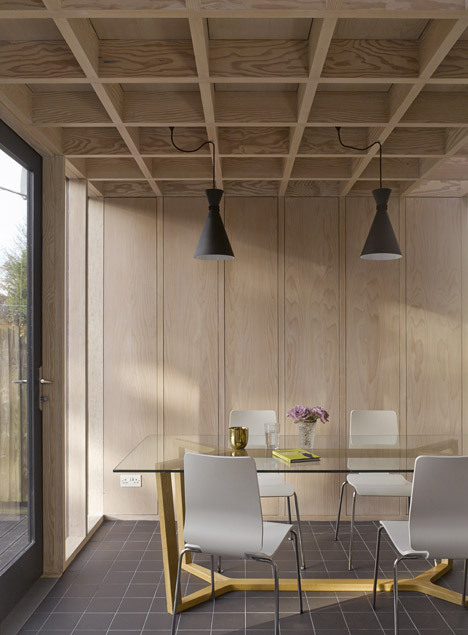 {Just love that ceiling, and how the geometry of it relates to the wall panels. Designed by Jonathan