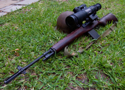 gunrunnerhell:  M14/M1ASort of a Vietnam-era style build, this M14 or M1A has an old AN/PVS-2 Night Vision Scope installed. It requires a special mount that places the scope offset from the axis of the more. Early night vision optics were gigantic due