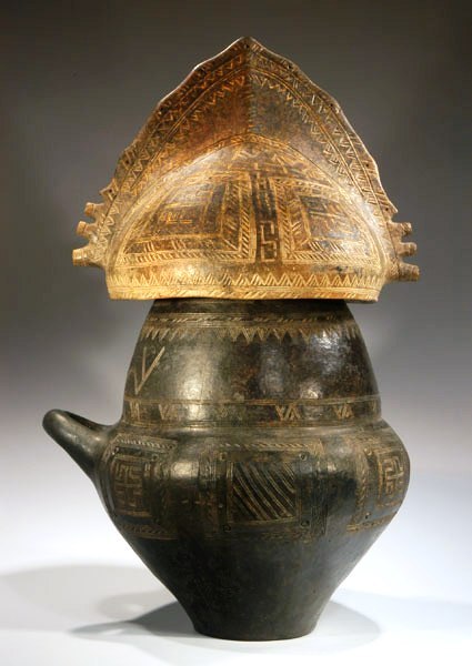 archaicwonder:Villanovan Pottery Urn with Crested Helmet Lid, 9th-8th Century BCWith a handle on one