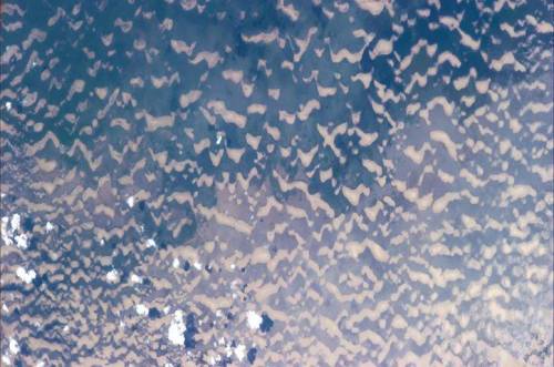 Sand and water in Lake Chad.Looking a bit like a graphic granite (see our recent post at http://tiny