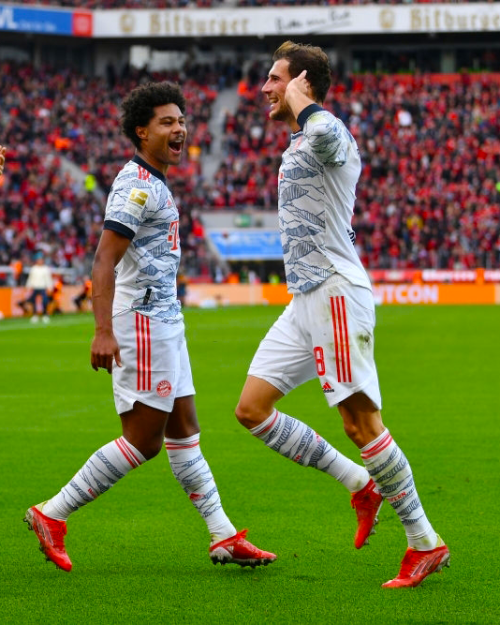 SERGE GNABRY &amp; LEON GORETZKA celebrate during FC Bayern vs. Bayer Leverkusen (October 17, 20