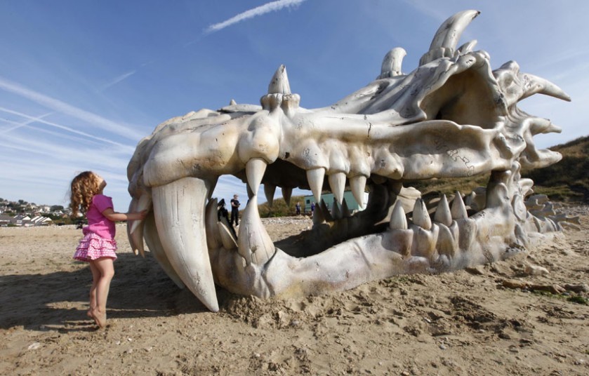 Fanciful relic (a 39-foot dragon skull sculpture was erected on Charmouth Beach,