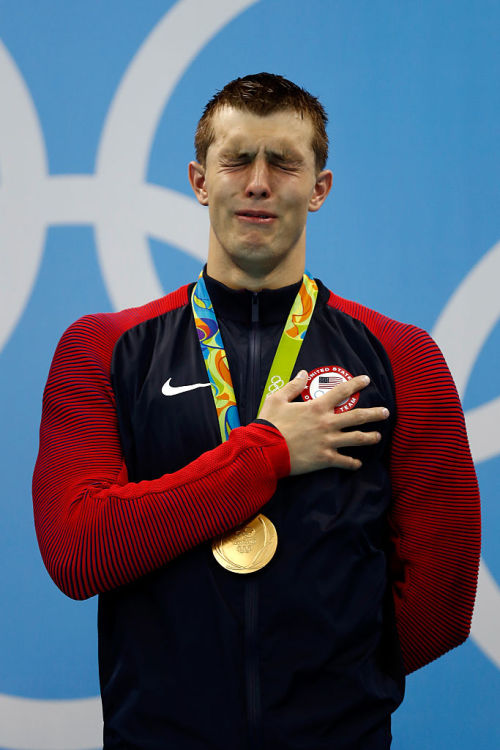 imwithkanye: Ryan Held on the podium during the medal ceremony for the final of the Men’s 4 x 100m 