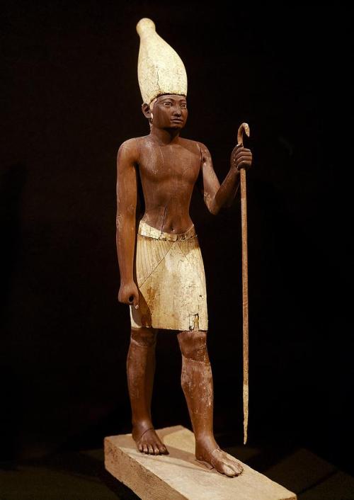 egypt-museum:Statue of Senusret IThis small wooden statue of King Senusret I was found in a private 