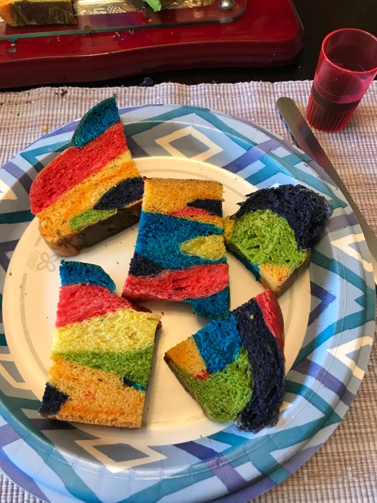 mystic-chord: So for pride, my mom made a rainbow challah, thought you guys might wanna see it. Here it is before it went in the oven: After: And when you cut it open: 