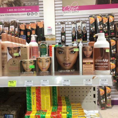 fucking disgusting amount of skin lightening products at a black beauty supply shop.