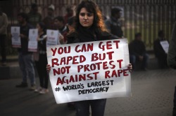 takealookatyourlife:  ed0ro:   Indian Gang Rape Protests New Delhi &amp; Kolkata December 27, 2012 AP Photo/Altaf Qadri   Can’t help but feel like if this was an American protest it would have way more notes. 