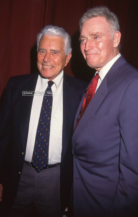 John Forsythe and Charlton Heston at an unknown event. 