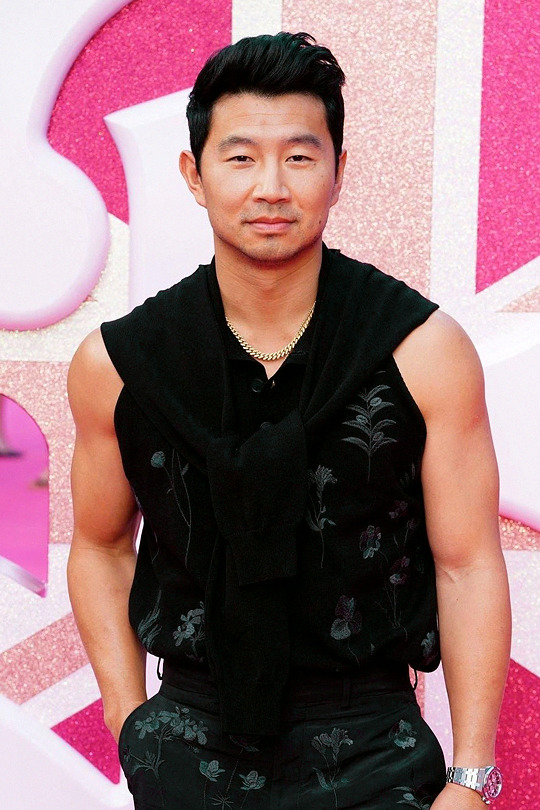 GQ Magazine on X: Simu Liu brings out the big guns at the #Barbie premiere  in London   / X