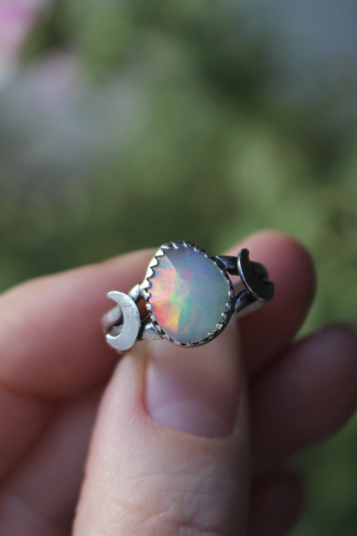 Iridescent opal ring with crescent moons