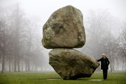 Letsbuildahome-Fr: Artist Peter Fischli Poses Next To Rock On Top Of Another Rock,