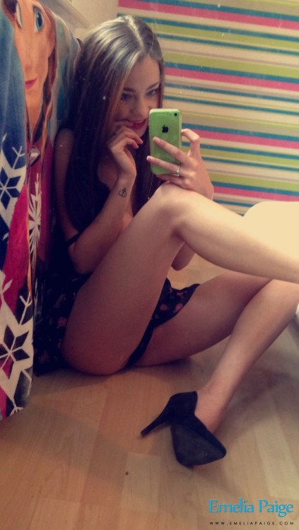 sexciiwomeninlingerieandbikinis:  Emelia Paige showing off her cute little dresses in these selfies…