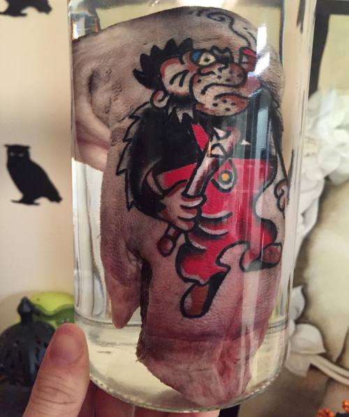 TATTOOED PIG FOOT one of my favorite oddites we own!!! Tattoo Artist: Rich Lucero 