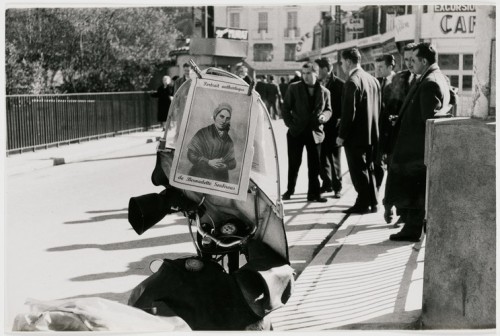 harvard-art-museums-photography:Motorcycle with religious poster, Lourdes, Henri Cartier-Bresson, 19