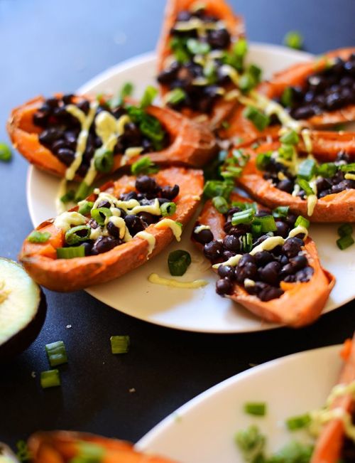 Loaded black bean sweet potato boats http://minimalistbaker.com/loaded-black-bean-sweet-potato-boats