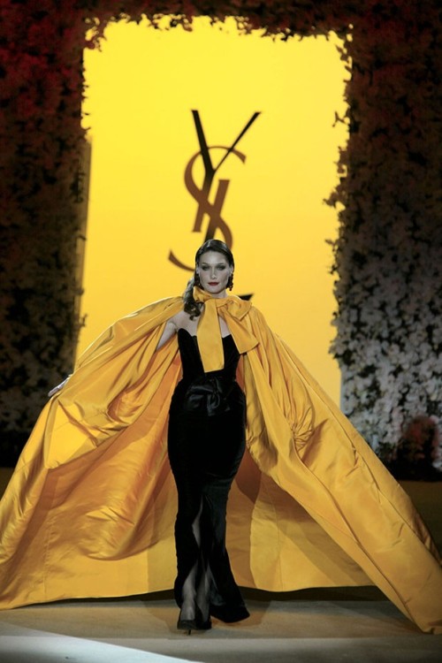 Velvet Sheath Dress and Faille de Chine Coat, fall/winter 1983Yves Saint LaurentModeled by Carla Bru