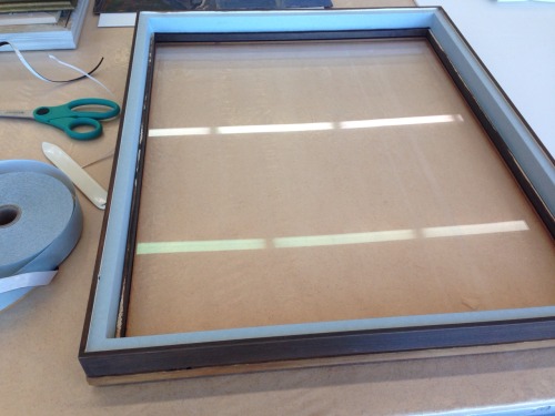 Preparing paintings for loan and sealing frames - everyday tasks of a paintings conservator in a mus