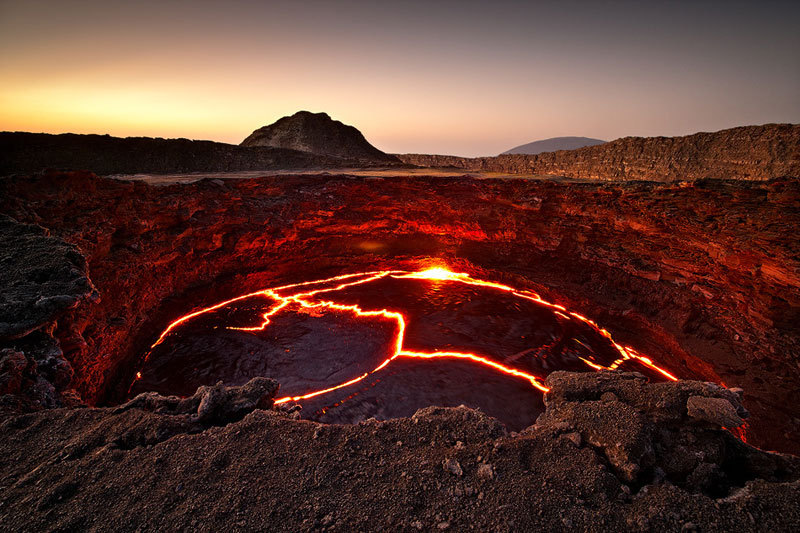 fameorbust: sixpenceee:  The lava lake of the continuously active volcano Erta Ale,