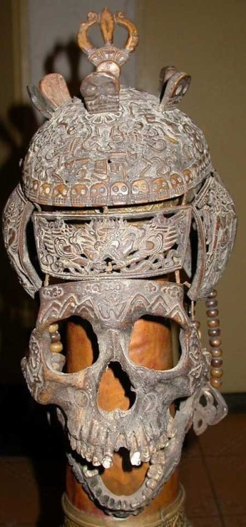 Extremely rare Tibetan shaman’s mask formed and carved from bits of a human skull.