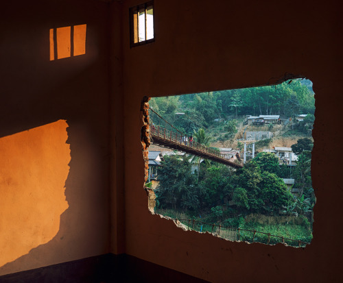 beautyofabandonedplaces:Inside of a house sliding down a cliff in Muang Khua, Laos [OC] [2000 x 1650