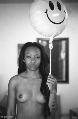 myblacksexuality:  film-god:  BrianaPhotographed by Q. OliverLeica M6 TTL   Leica Summicron 50mm   Ilford HP5   King Pleasure 