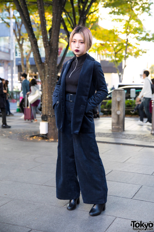 Japanese student Juri on the street in Harajuku wearing a dark look featuring a velvet blazer over a