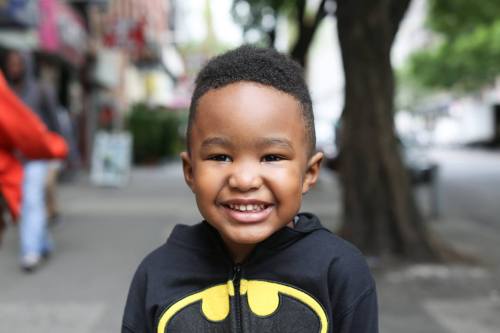 theijeoma:  humansofnewyork:    “He probably won’t answer you. He has a speech delay. He talks plenty at home, but strangers have a hard time understanding him. So he’s learned that if he just smiles a lot, people will like him, and they won’t