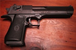 gunrunnerhell:  Desert Eagle A very early model, the frame sizes differed up until the XIX models standardized them. This particular example is chambered in .357 Magnum. In spite all of the haters towards the Desert Eagle, it’s been around for almost