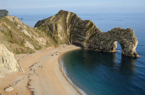 Durdle Door, Dorset, England.“They persuaded me to keep on, and at last stranded me on the peb