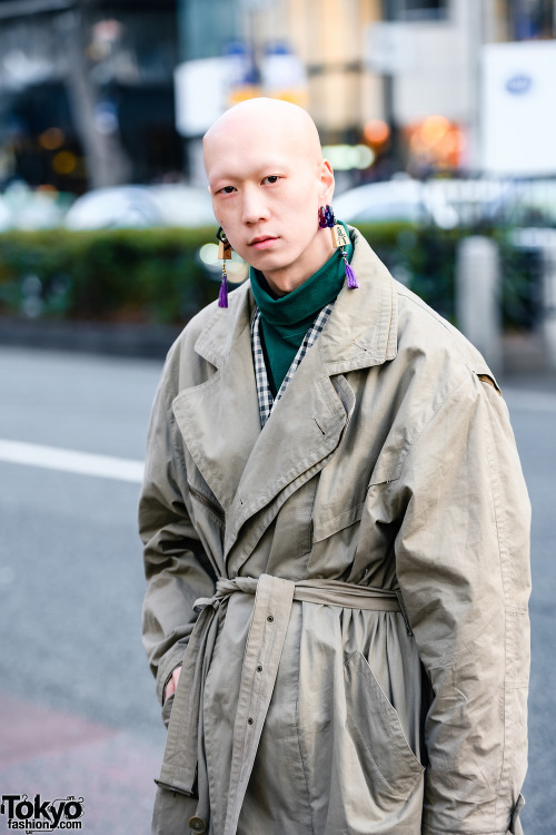 Japanese musician/actor/model Shouta on the street in Harajuku wearing a vintage overcoat with layer