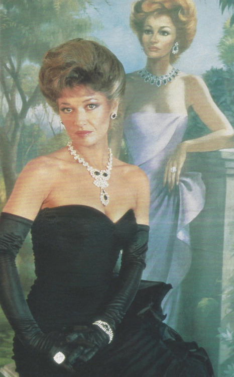 denver-carrington: Stephanie Beacham posing in front of her portrait in The Colbys.