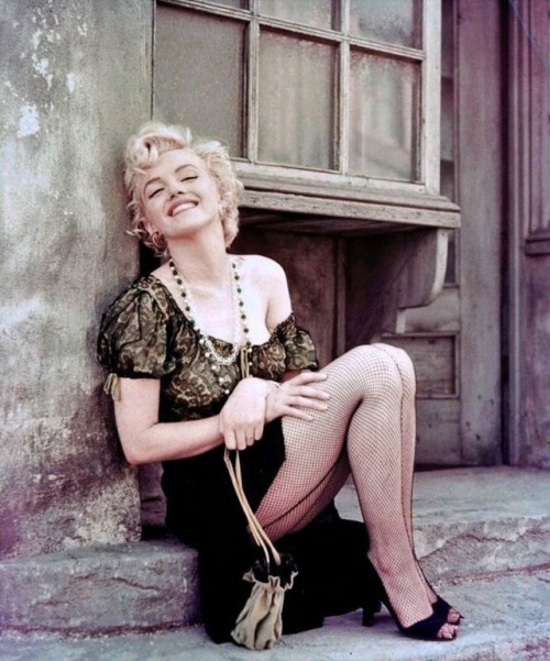 talesfromweirdland:Marilyn Monroe on an abandoned movie set in 1956. Photo taken by her friend, Milt