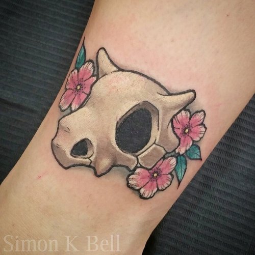 gamerink:Cubone tattoo done by Simon K Bell.