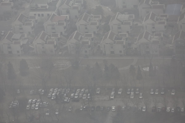 Update on the Beijing smog issue: This picture is from Wednesday. The government has put forth emergency measures such as shutting down 100 factories and cutting down on one-third of government vehicles on the road.