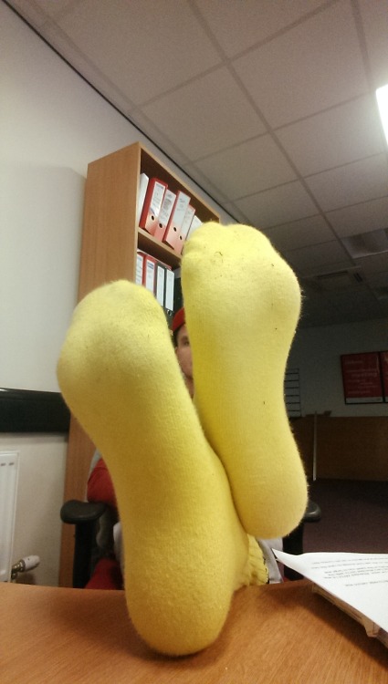 fuckyeahmalefeet:  This British foot Master is all alone in his office with those big beautiful feet not getting the attention they rightfully deserve. Which one of you foothorny slaves wants to crawl under that desk and keep those big size 11s warm with