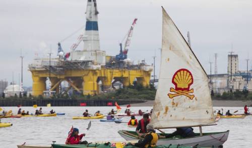 micdotcom:  Awesome photos show the “Shell No” kayak protest in Seattle this weekend This Saturday, hundreds of environmental activists turned out in Seattle to celebrate a day-long festival called the “Paddle in Seattle” and protest Royal Dutch