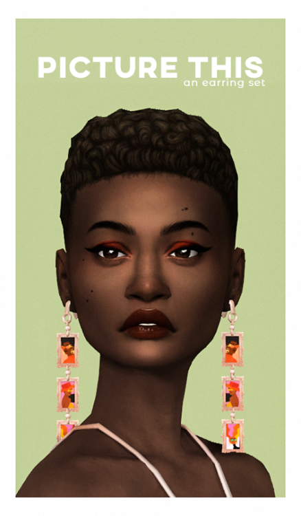 depthofpixels-cc:These bad bois are a set of earrings. (Obviously) They feature art from two of my