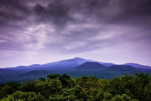 Hallasan Mountain and a few of its 368 parasitic cones on a stormy day.